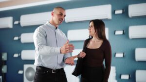 A sales representative talking to a potential lead